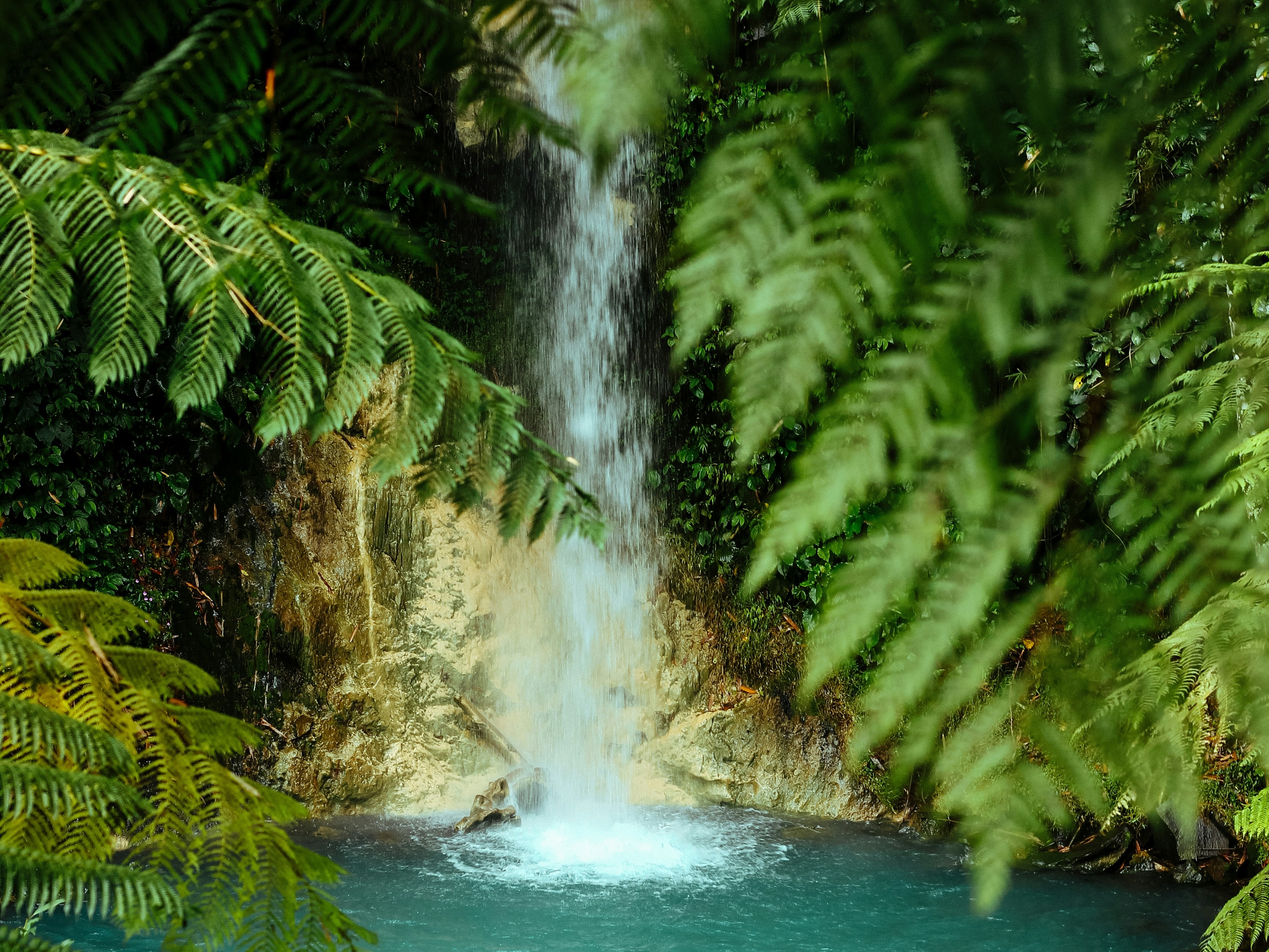 Falaq Lazuardi waterfall photo from Unsplash