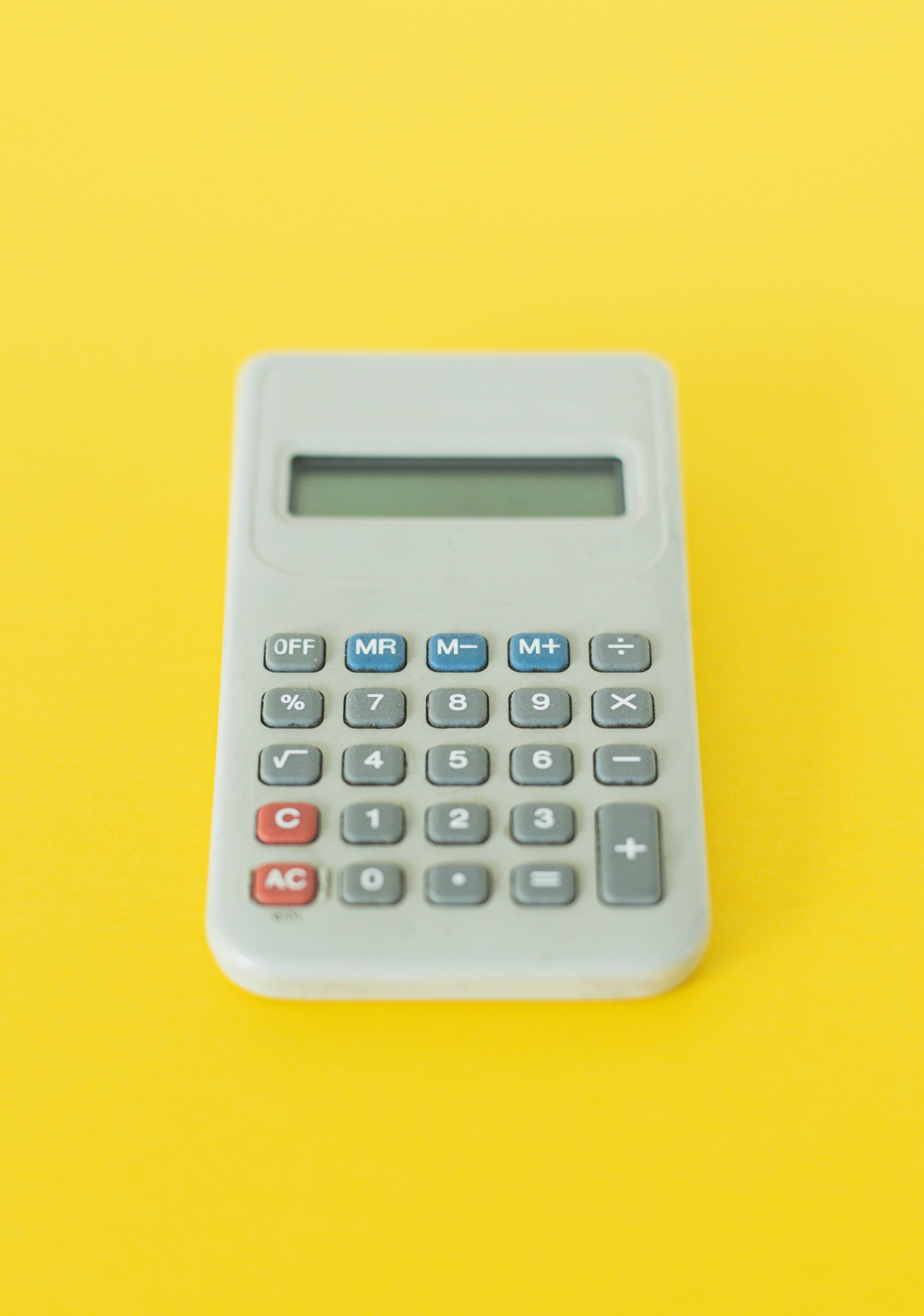 Calculator on a yellow background